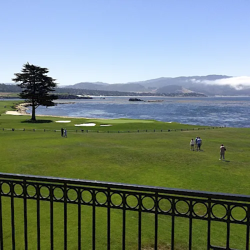 The 18th green of Pebble Beach Golf Links beside the ocean
