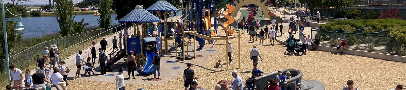 Colorful play structures at Dennis the Menace Park in Monterey
